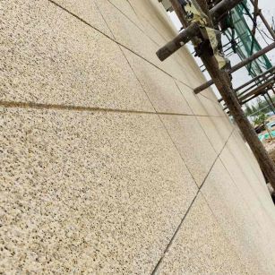 信阳 黄金麻花岗岩荔枝面外墙干挂石材效果示例