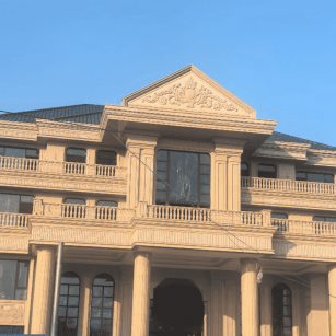 信阳黄金麻别墅外墙干挂石材效果示例