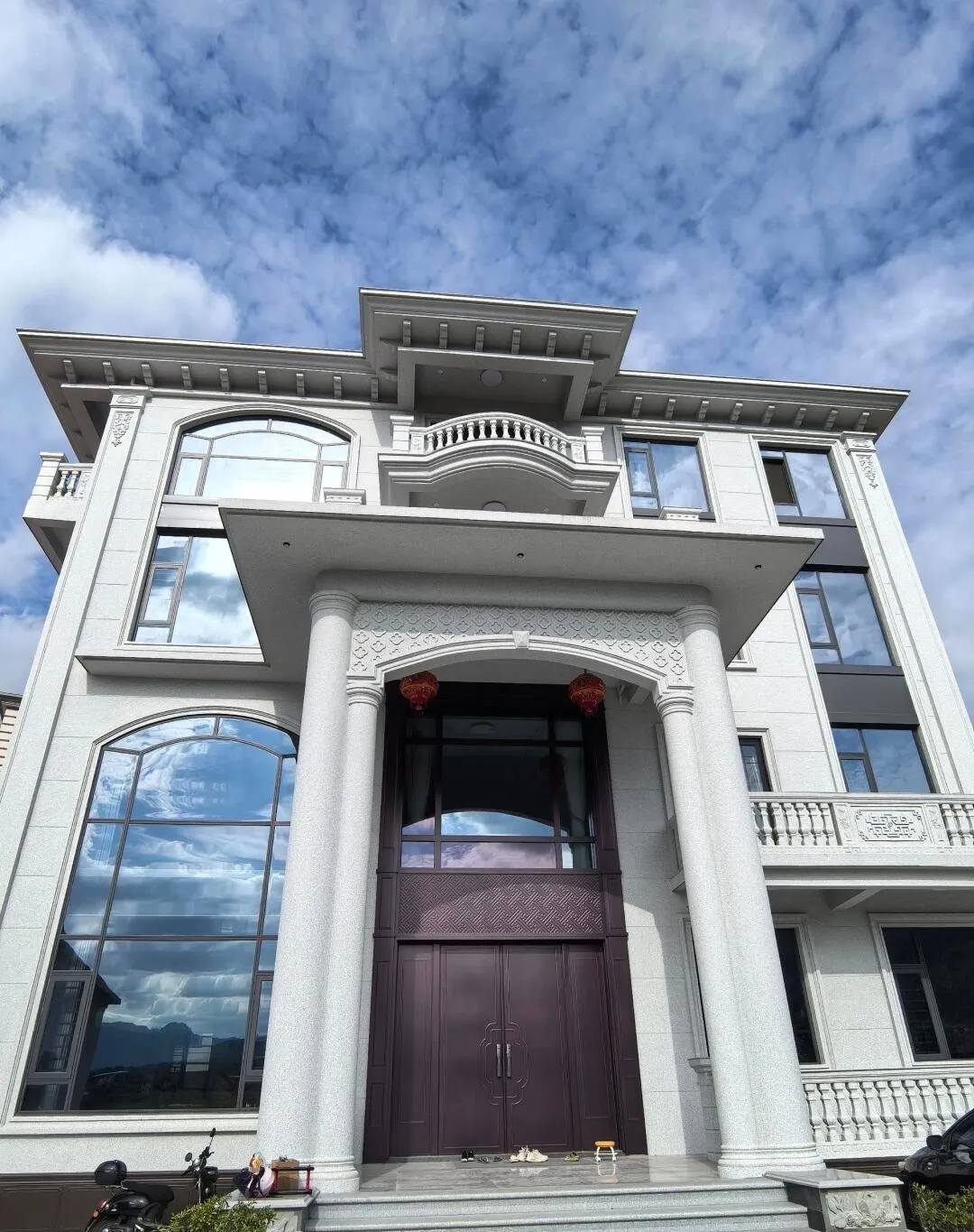 信阳白麻别墅外墙干挂石材效果示例